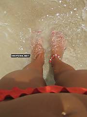 Middle-aged wife loving a happy vacation with her husband, watch her posing nude on at the sea, swimming naked, showing pussy, flashing her vagina underskirt in souvenir shops and more