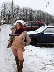 Cute russian nymph walking naked in the streets in winter, She takes her coat off and posing absolutely nude, showing good body, cute knockers and sweet looking cunt