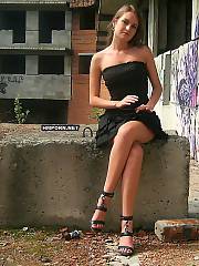 Sweet girlie walking at abandoned places and flashing nude pink twat up-skirt and close-up