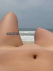Beautiful nymphs sunbathing naked on the beach, see very hot and so exciting amateur and voyeur xxx photos of pussy flashing on public beaches