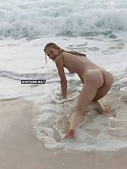 Sweet ordinary babes and sexy and nasty mature women spreading legs wide and flashing cunts during the sunbathing process on nudist beaches