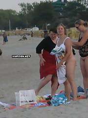 Ordinary women taking panties off on the beach, horny women flashing naked cunts with no panties upskirt, exciting views between legs of college gals on grass
