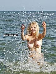 Beautiful woman dancing naked in the sea, Her smile is so sweet and her good body is so fuckable, Her lover is definitely a lucky man
