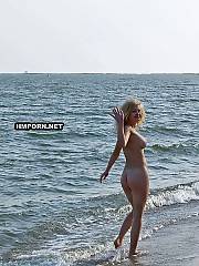 Beautiful woman dancing naked in the sea, Her smile is so sweet and her good body is so fuckable, Her lover is definitely a lucky man