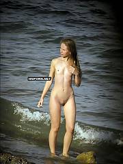 Nudist and naturist girls walking nude and spreading legs wide, being caught by voyeurist cameras on worldwide beaches