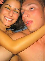 Cheerful and so happy amateur couple making love and having wild sex at home on bed, taking naked selfie pictures of themselves and closeup penetrating act