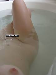 Lovely gf taking a foamy bath and flashing her tasty goods to tease her lover who takes photos of her nude body, Her sweet pussy, nice tits, sexual legs and feet and of course amazing ass will make your cock hard too