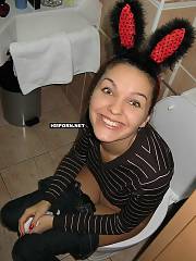 Sweet smiling bunny girlfriend going wild at home and showing her sweet vagina between wide spreaded legs at home