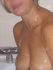 My mother washing up, i dont think she understands that pictures from my phone can appear on the web within seconds