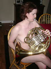 It was her idea to do a few photos with the french horn, which makes her hot and crazy at the same time