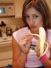 This slut enjoys banana so much.