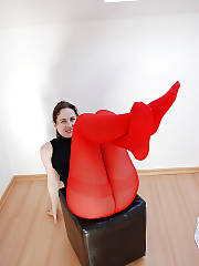 Mature lady in red tights positions on cam.