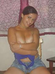 Hot puertorican girlie stripteasing at home.