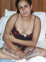 Pretty arab girl posing nude on bed and in the bathroom.