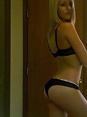 Hot amateur blond babe in bikini positions on cam.
