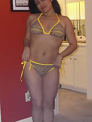 Here is the ex in a yellow bikini and out of it adding a little surprise by playing with her pink fucktoy dildo!
