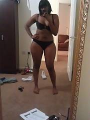 Dark skinned wifey posing for some good underwear and tittie shots