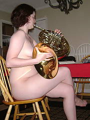 It was her idea to do a few photos with the french horn, which makes her hot and crazy at the same time