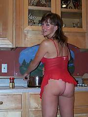 Sexy wifey shows off her tight and tiny little body in the kitchen.