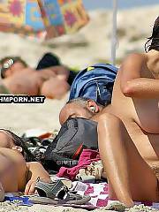 Amazing voyeur sex pictures of real amateur babes and mature women sunbathing nude on the nudist beaches worldwide - love their sweet nude vagina views