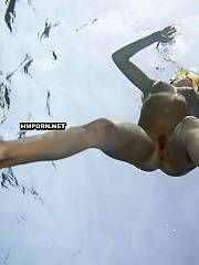 Mature and young women swimming nude in the sea or pools and here you can see their sexual fuckable bodies underwater - voyeur amateur sex pictures