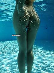 Mature and young women swimming nude in the sea or pools and here you can see their sexual fuckable bodies underwater - voyeur amateur sex pictures