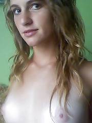 Nasty blondie amateur girl poses naked on cam.