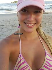Lovely smiling chick taking dressed and undressed selfie sex shots on vacation, watch dressed in swimsuit and posing at the sea and then exposing nude backside and vagina and fingerfucking rectal hole