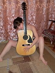 Nice amateur woman posing with guitar Homemade Amateur Guitar